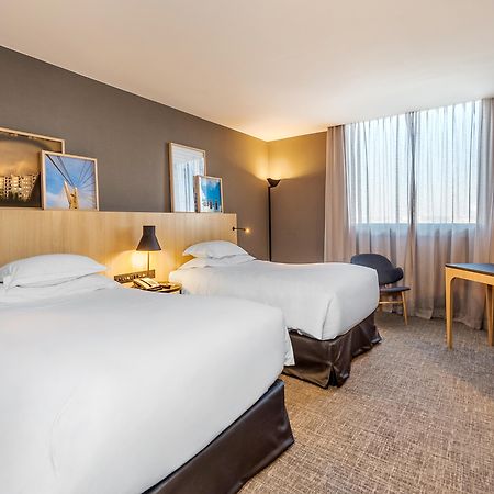 Pullman Sao Paulo Guarulhos Airport Hotel Bagian luar foto A room at the hotel